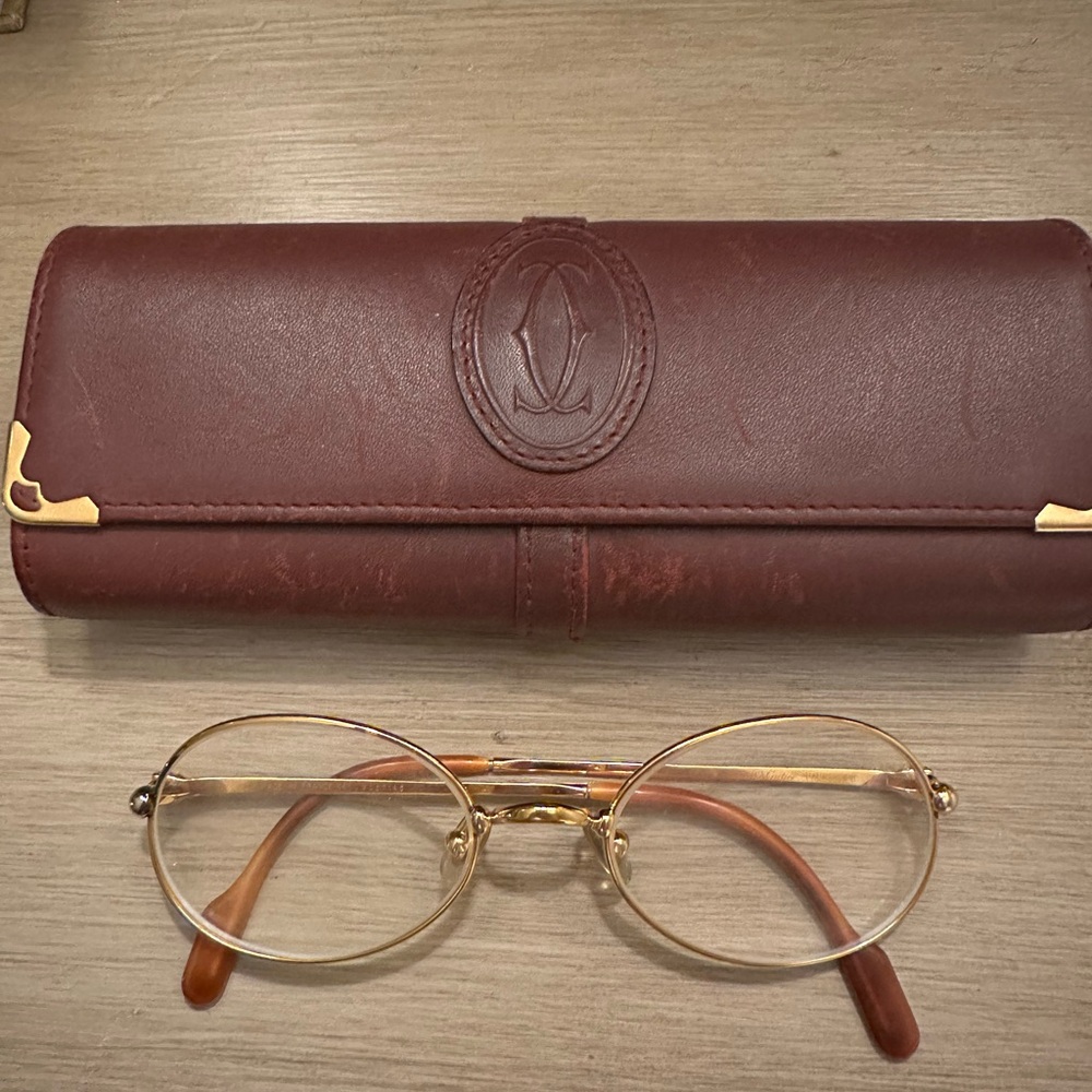 Cartier Gold Frame Sunglasses with Brown Temple Tips and Clear Lenses